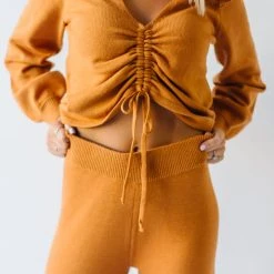 Piper & Scoot Tops The Charlie Cinched Ruffle Sweater In Rust