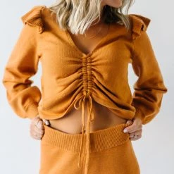 Piper & Scoot Tops The Charlie Cinched Ruffle Sweater In Rust
