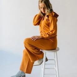 Piper & Scoot Tops The Charlie Cinched Ruffle Sweater In Rust