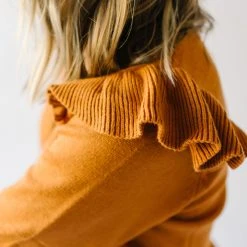 Piper & Scoot Tops The Charlie Cinched Ruffle Sweater In Rust