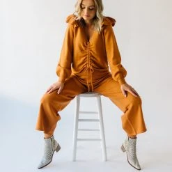 Piper & Scoot Tops The Charlie Cinched Ruffle Sweater In Rust