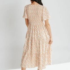 Piper & Scoot Dresses The Rodney Smocked V-Neck Midi Dress In Ivory
