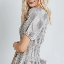 Piper & Scoot The Marylin Smocked Peplum In Grey Tops