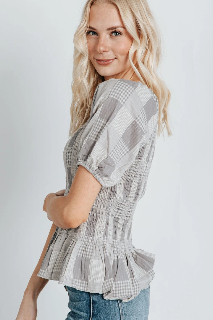 Piper & Scoot The Marylin Smocked Peplum In Grey Tops
