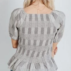 Piper & Scoot The Marylin Smocked Peplum In Grey Tops
