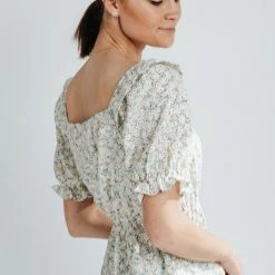 Piper & Scoot The Tien Ruffle Floral Peplum Top In Ivory Tops