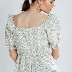 Piper & Scoot The Tien Ruffle Floral Peplum Top In Ivory Tops