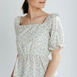 Piper & Scoot The Tien Ruffle Floral Peplum Top In Ivory Tops