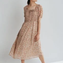 Piper & Scoot Dresses The Magnus Smocked Floral Midi Dress In Faded Peach