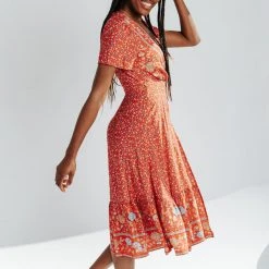 Piper & Scoot Dresses The Sandstrom Patterned Wrap Dress In Red