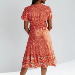 Piper & Scoot Dresses The Sandstrom Patterned Wrap Dress In Red