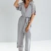 Piper & Scoot The Stutz Patterned Jumpsuit In Denim Blue Bottoms + Jumpsuits