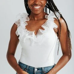 Piper & Scoot The Niccole Ruffle Bodysuit In Off White